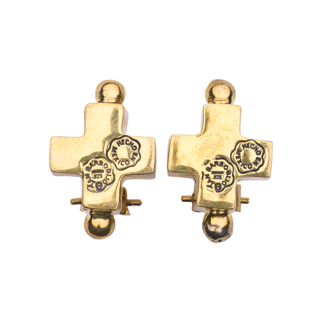 Two bronze cross earrings with one bead on top and another at the bottom. Each cross has two engraved seals. Plain background.