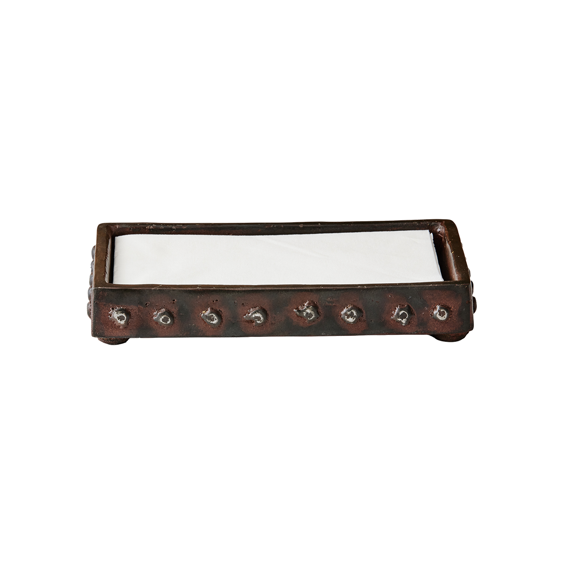Wax cast iron rectangle napkin holder with beaded detail trim. With white napkins inside it.