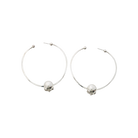 Two simple  earring hoops with a silver bead. Plain background.