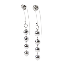 Two silver earrings with a hook and several silver beads.