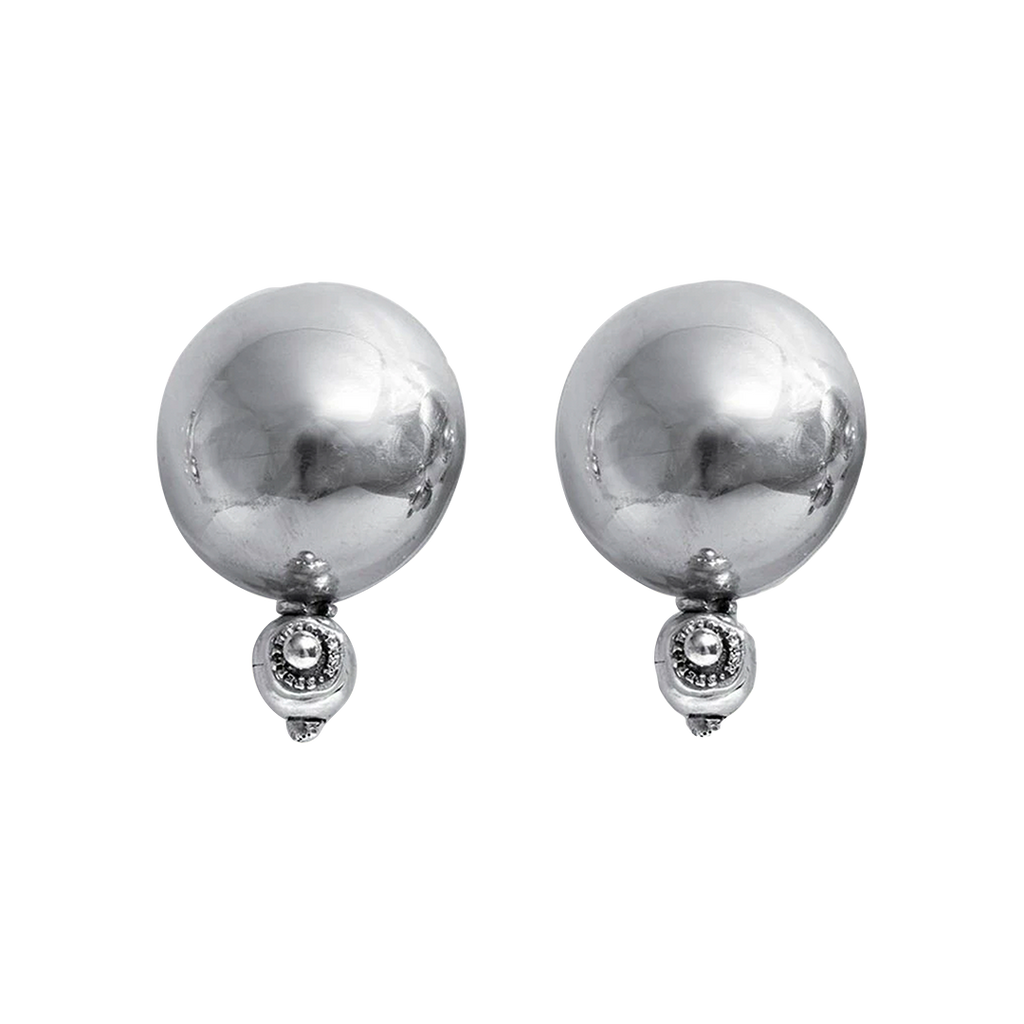 Two silver circle earrings with a silver ball underneath.