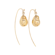  Two hook earrings. Each one holding an egg shaped bronze design with two seals each.