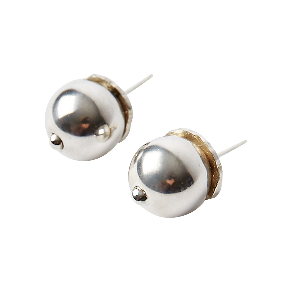 Tow silver stud earrings.