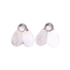 Two silver earrings with engraved seals. 