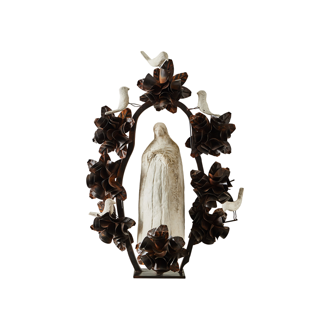 A hand carved stone statue representing the spirit of the virgin of  Guadalupe surrounded by an aura and halo of iron flowers and stone birds. 