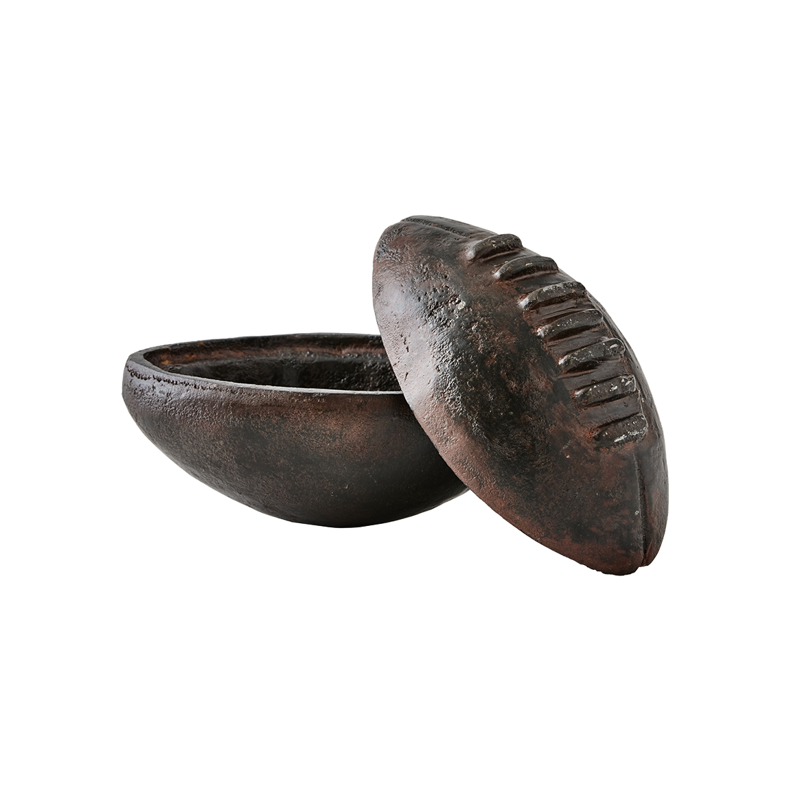 A iron football box with the lid resting on its side.